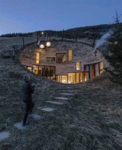 house built into the side of a hill