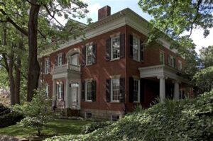 old house built on property line